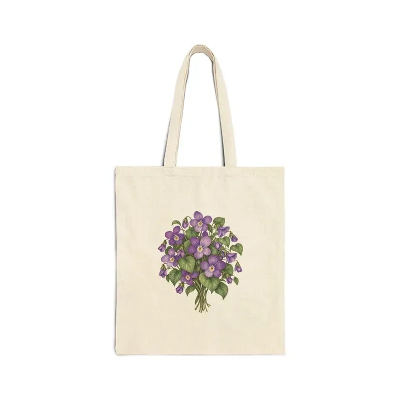 February violet bouquet on a natural canvas tote — digital mockup