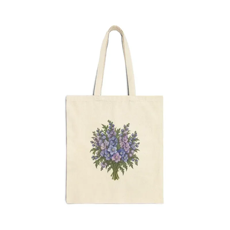 July larkspur bouquet on a natural canvas tote — digital mockup