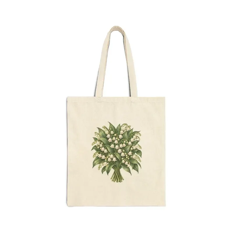 May lily of the valley bouquet on a natural canvas tote — digital mockup