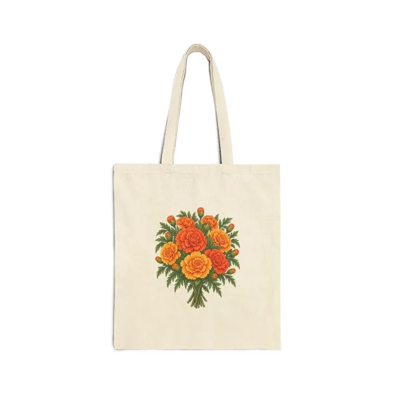 October marigold bouquet on a natural canvas tote — digital mockup